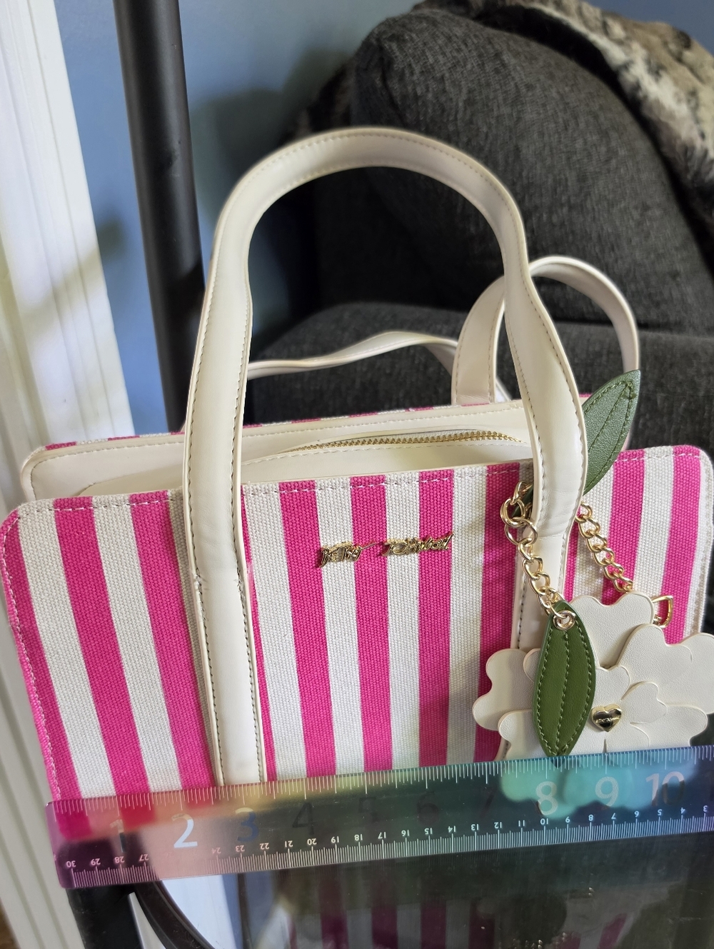 Betsey Johnson White & Pink Striped Women’s Handbag with Floral Charm